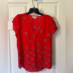 Red vneck printed blouse from LOFT, size L. Cute for work or casual with shorts